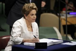 Brazilian President Dilma Rousseff signs the Paris Agreement on climate change at United Nations Headquarters in Manhattan, New York, U.S., April 22, 2016. REUTERS/Carlo Allegri
